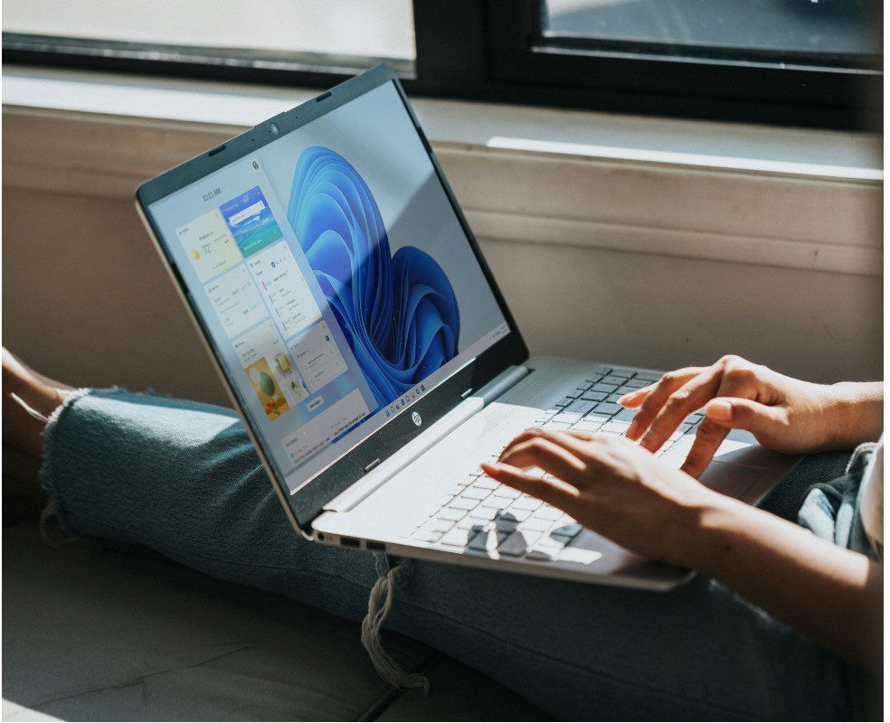 person working on Windows 11 computer