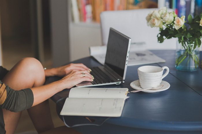 young woman using a laptop